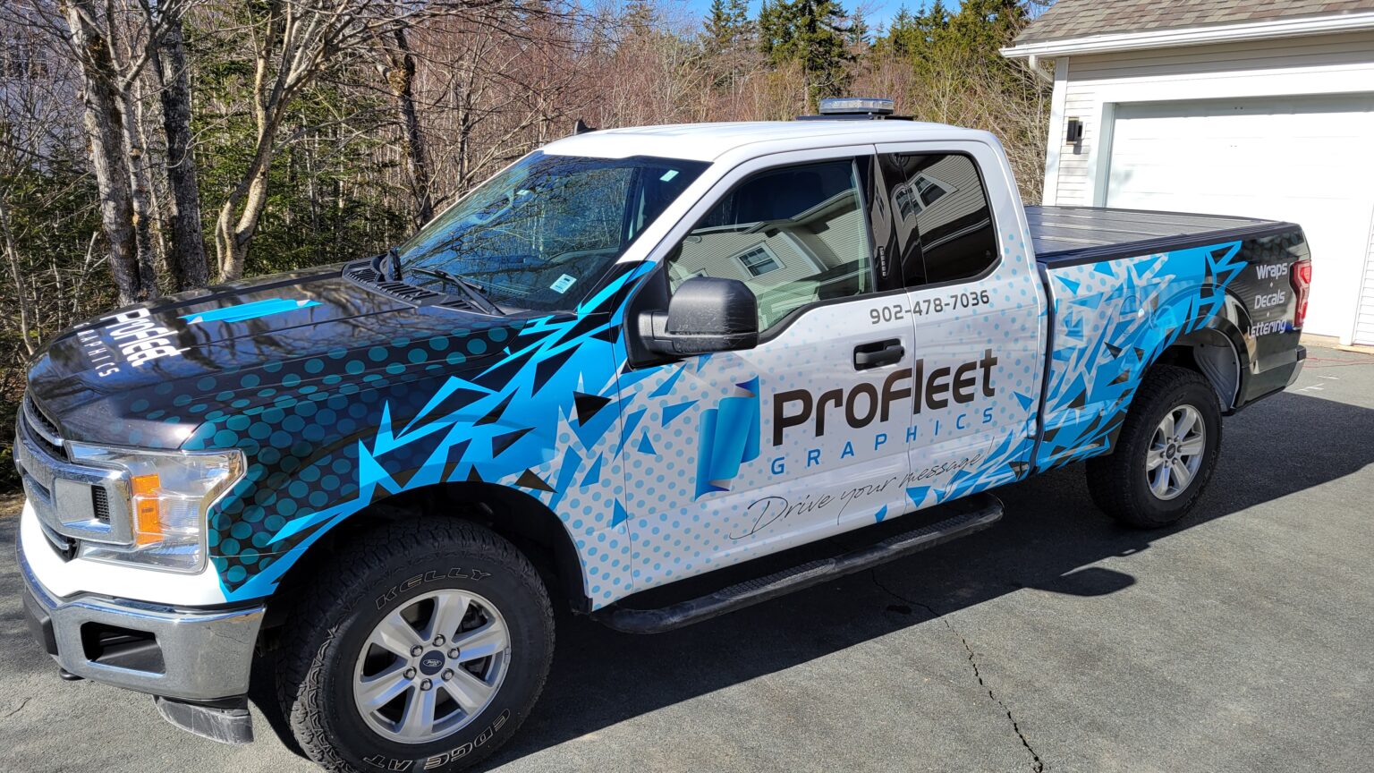 ProFleet Graphics' wrapped F-150 — fleet branding example